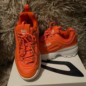 Orange FILA Disruptors